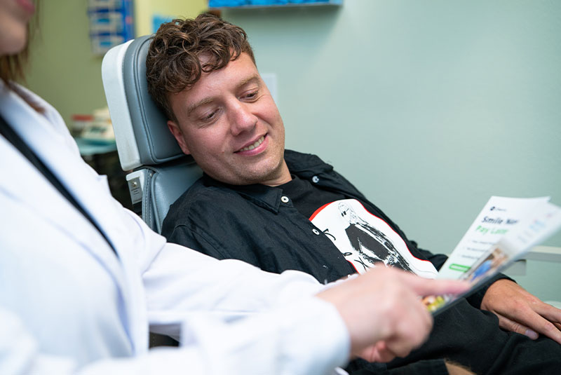 Doctor going over papers with Patient