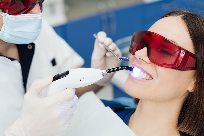 woman getting her teeth whitened