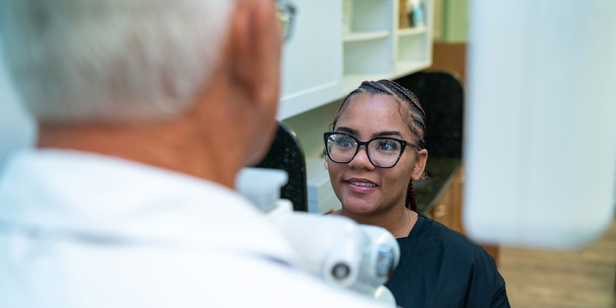 team member taking a dental x-ray