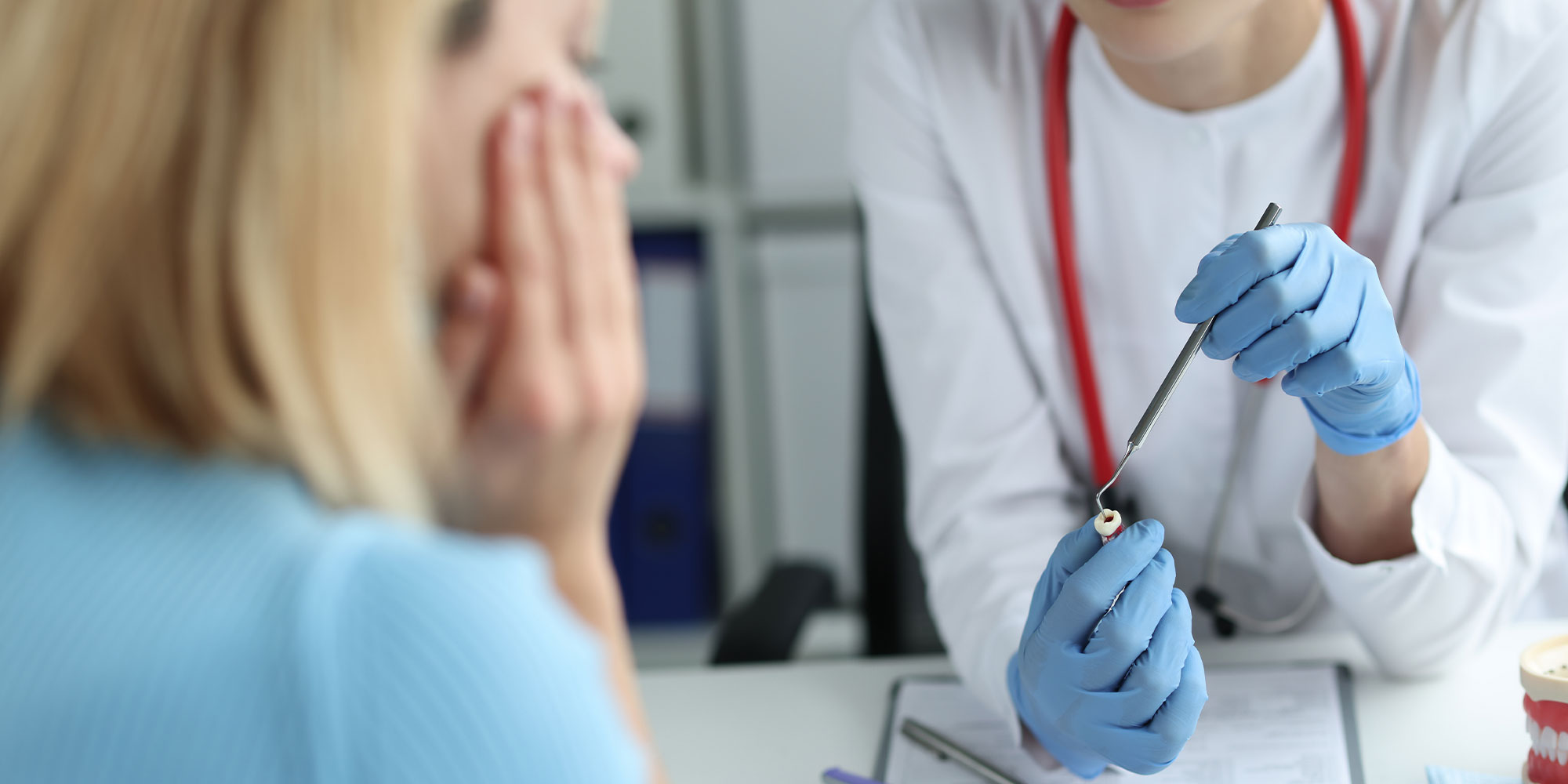 Patient with toothache at reception in dentistry
